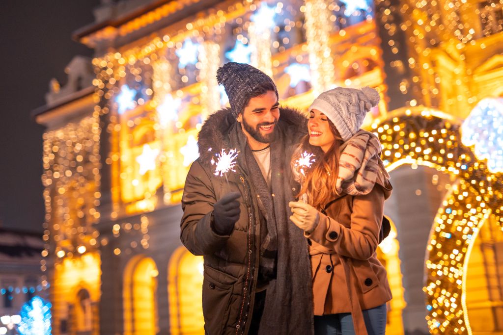 Couple enjoying Christmas light display